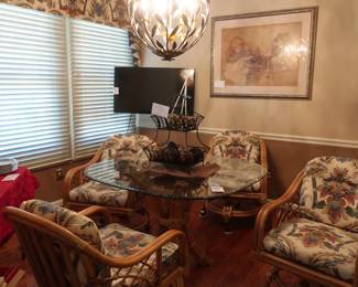 Dinette  set  with  glass top  and  four  chairs