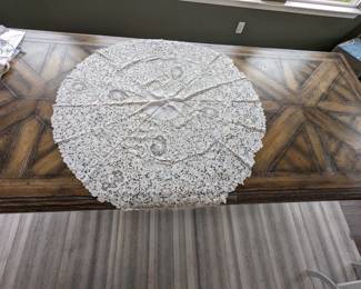 25.)  Edwardian Brussels Lace Round Tablecloth.  Handmade with some Point de Gaze style.  Scalloped edge.  Linen batiste center.    42" diameter.  Excellent condition. $245.00  Sale:  $196.00