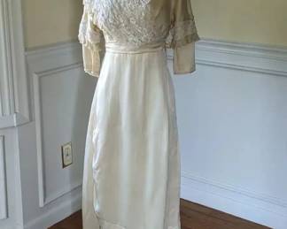 10.)  ca 1900's Bridal/Wedding/ Evening  Dress (?) bobbin tape lace, beads, faux pearls.  Overall condition of gown is excellent except for 1 tiny repair in front  bottom of skirt.  Belt needs a hook and eye to fasten, Minor damage on sheer neckline, and slightly dirty in back.  Beading missing on edge of 1 sleeve.   Measures:  shoulder to shoulder - 14"  Bust - 28"',  Waist -22",  Length - 53"   $425.00  Sale:  $340.00
