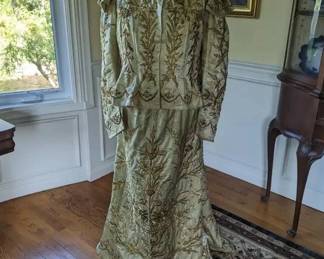 2.)  ca 19th century Luminous Ottoman, Turkish Gold Metallic  Embroidery Ladies Ensemble. Metallic embroidery is raised and beautifully worked.  Good strong condition but has had many repairs by an experienced restorer. Other areas of wear not restored. Slight underarm discoloration.  Boning in jacket with hook and eye closure.  Train in back.  Large size.   Measures:  shoulder to shoulder - 14", Bust - 33 inches, Waist - 27:, Length 57".   $2300.00  Sale:  $1610.00