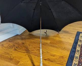 3.)  Black Parasol/Umbrella with Brass and Mother of earl Handle.  Monogrammed FMS.  1 spoke broken.  Pin holes in cover.   Stunning handle.  $145.00  Sale:  $99.00