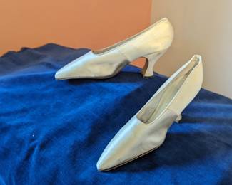 7.)  Antique Ivory satin shoes.  Labeled Boggs & Buhl, Pittsburg, PA.  Satin is in excellent condition.  A few areas of dirt and some staining on the heels.  Measures:  10" long x 2 3/4" wide.  $ 92.00  Sale: $69.00