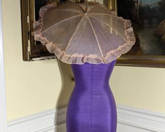 8.)  Pink parasol from the J.L. Hudson Co.  Wooden handle with metal spokes.  Spokes have white celluloid tips.  Still has original tag from Hudson's.  Excellent condition.  $68.00