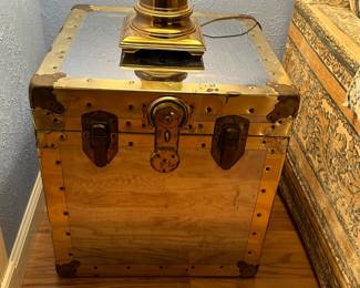 We have two of these metal clad, brass-trim dual-purpose trunk / tables