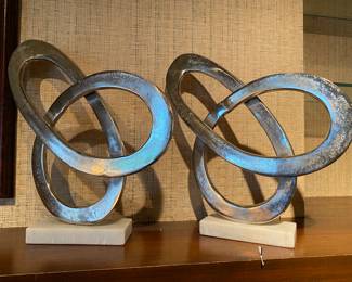 heavy designer metal and marble sculptures