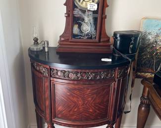 Exquisite, curved commode table w/ door
