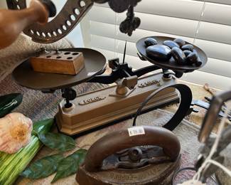 Antique Force 2kg cast iron balance scale and an antique Taylor-Forbes sad iron.