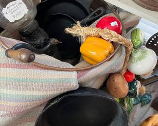 Several cast iron Griswold & Wagner skillets