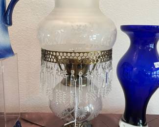 We have a pair of these vintage boudoir lamps!