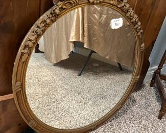 Ornate antique round mirror