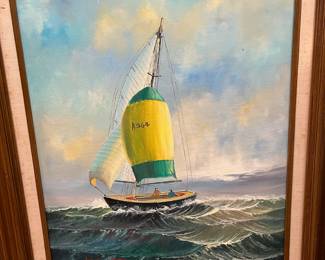 Framed oil painting of a sailboat by H. Anderson
