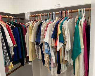 closet full of nice clothes and shoes