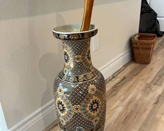 Porcelain floor vase with a cedar walking cane