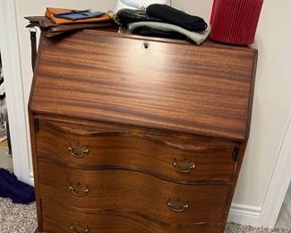 Gorgeous serpentine front secretary desk