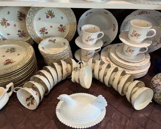 Modd Rose cups and a glass hen on nest.