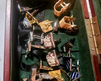 lots of men's cufflinks, lapel pins and tie tacks