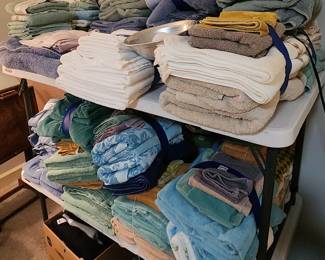 lots of towels and sheets sets