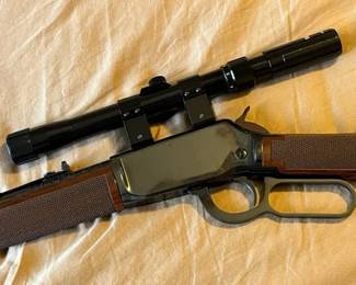 It comes with the Tasco scope