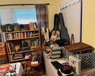 Castillo guitar with case in the background.