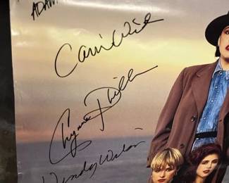 Signed by all three members of the band