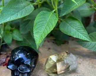 Obsidian skull on the left, double point citrine on the right.