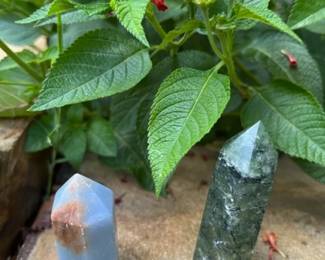 Prehnite with black tourmaline on the right