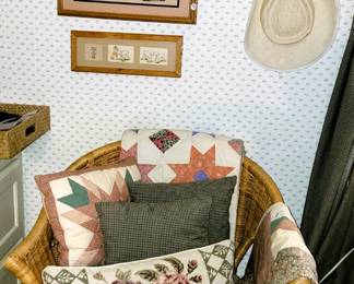 Wicker chair, cowboy hats, framed art