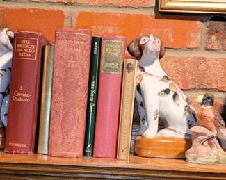 Antique mantle clocks, dog book ends. New to old books