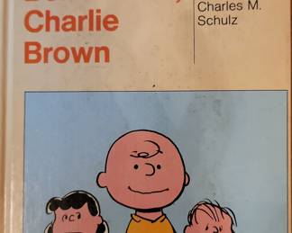 Charlie Brown Charles Schulz Peanuts Hard-bound book set and puzzles