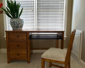 Stanley desk and chair; Asian fish bowl; artificial plant