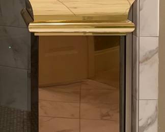 Mirrored plant stand; towels