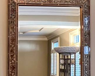 Wall mirror with enameled frame