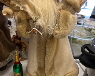 Santa with dolls figurine