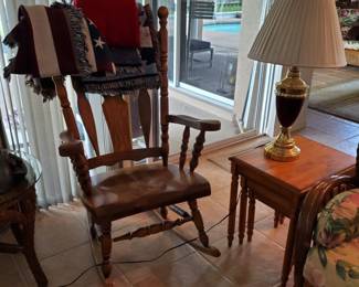 Old Heavy Rocker  needs repair.  stackable wood tables