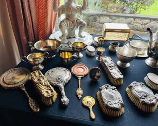 A collection of sterling and silver plate. 