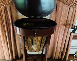 A fine quality circa late 1800s oval sewing stand. 