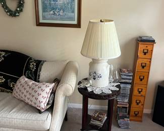 Tall CD/DVD holder, milk container lamp, and nice oval wood side table too