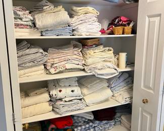 Linens and cleaning supplies, along with towels, and more