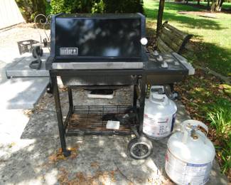 BBQ grill.  Propane tanks are sold seperately