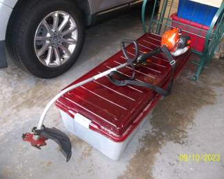 Echo trimmer, Christmas tree in plastic container 