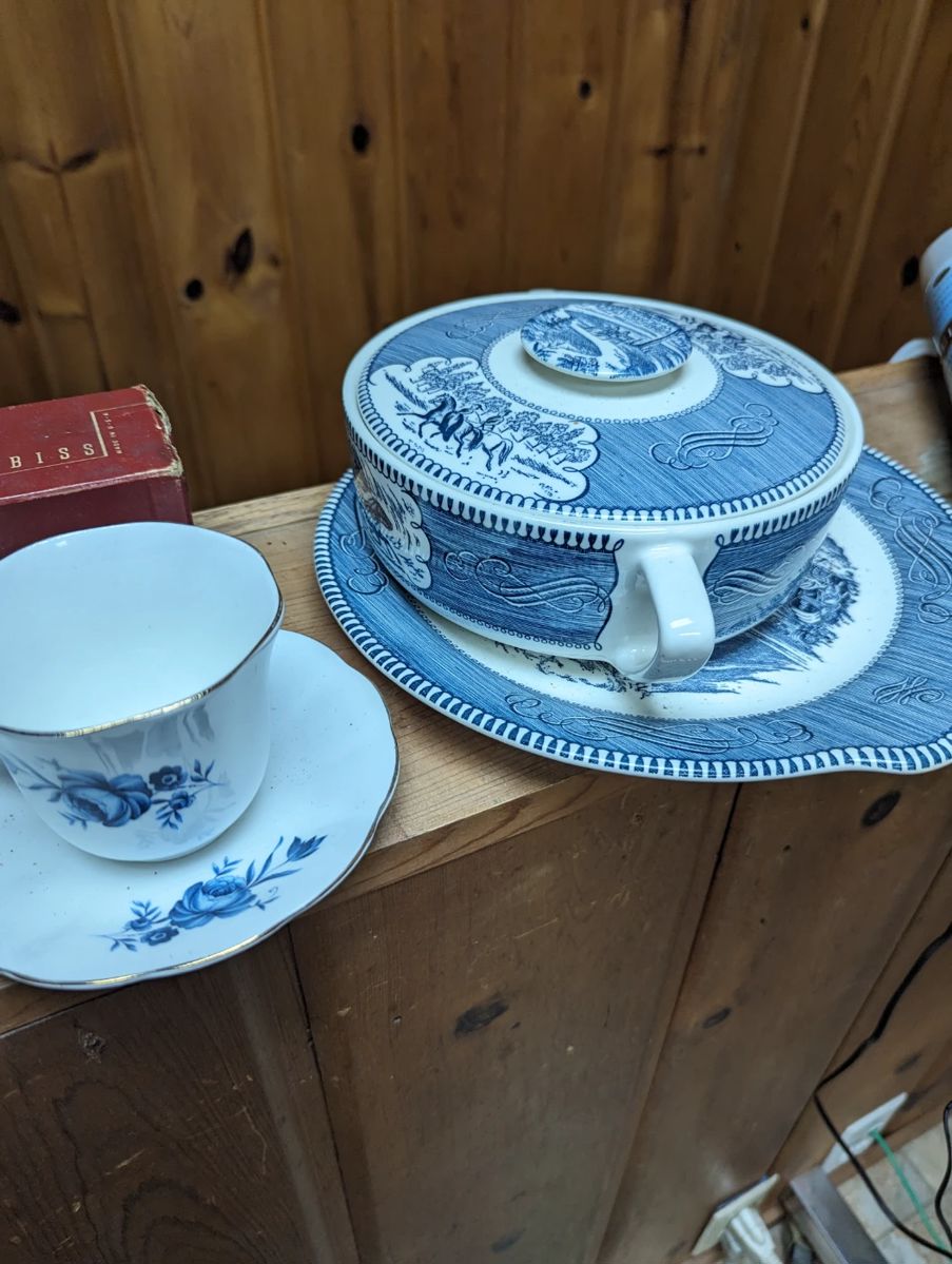 Currier and Ives pieces and cups and saucers