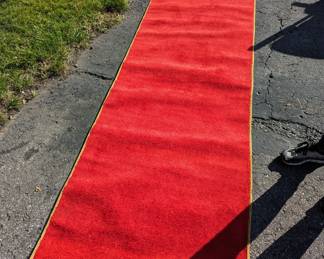 Red Neiman Marcus Rug runner. Great for a wedding or some other time to roll out the red carpet