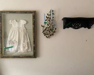 Framed baby dress and bonnet /  Candelabra  / wood shelf