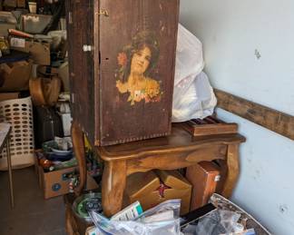 Side of the cuticura cabinet w Victorian lady