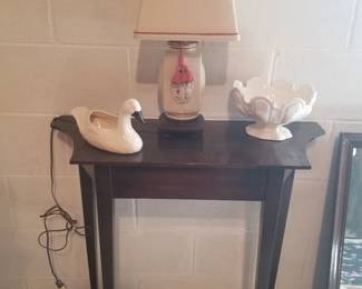 Console table, porcelain duck, and beautiful bowl