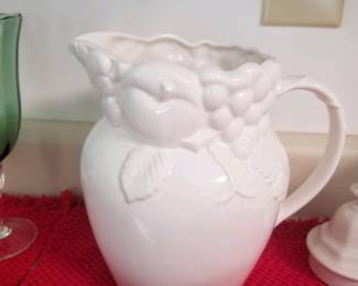White porcelain embossed fruit design pitcher