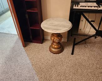 Vintage1970 Continental Art Co  Carrara marble and Chalkware  Grape End Table
Good condition- metallic gold painted -20” tall and 17” wide 
