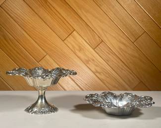 REED & BARTON STERLING BOWLS | Reposse Sterling bowls by Reed & Barton decorated with embossed floral reliefs, stamped "Reed & Barton Sterling / X569 / Francis I, including a low bowl (8 in. 10.2 ozt) and compote (8 in. 12.8 ozt); total weight 23.1 ozt. - h. 4.5 x dia. 8 in (larger)