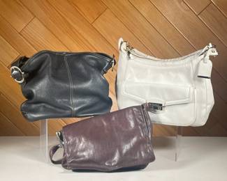 (3PC) SET OF LEATHER HANDBAGS | Three leather handbags, one white Cole Haan, One brown, flat DKNY, and one Black Liz Claiborne handbag. - l. 12 x w. 5 x h. 12 in (Size of largerst (Liz Claiborne))
