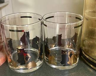 Signed gold and black cats barware